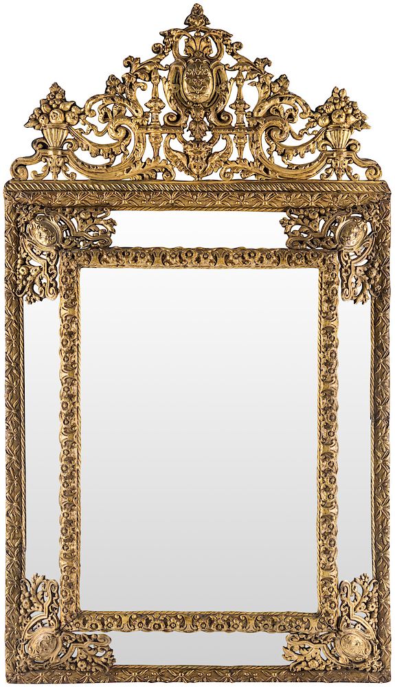 Appraisal: AN ANTIQUE FRENCH GILT METAL REPOUSSE WALL MIRROR AN ANTIQUE