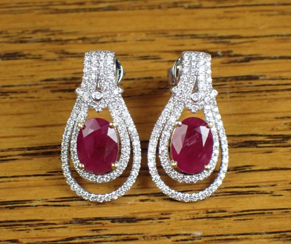 Appraisal: PAIR OF RUBY AND DIAMOND DROP EARRINGS each k white