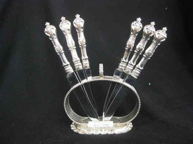 Appraisal: Set of Sterling Silver Fruit Knivesin ornate silverplate holder excellent