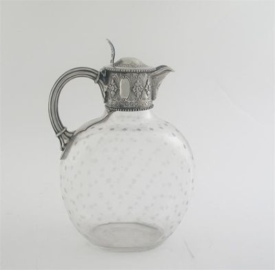 Appraisal: A Victorian mounted cut glass claret jug embossed mount with