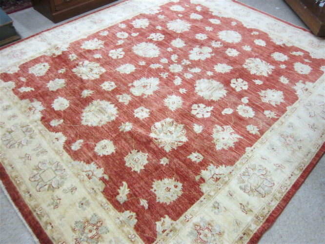 Appraisal: HAND KNOTTED ORIENTAL CARPET Pakistani-Persian overall floral arabesque decoration on