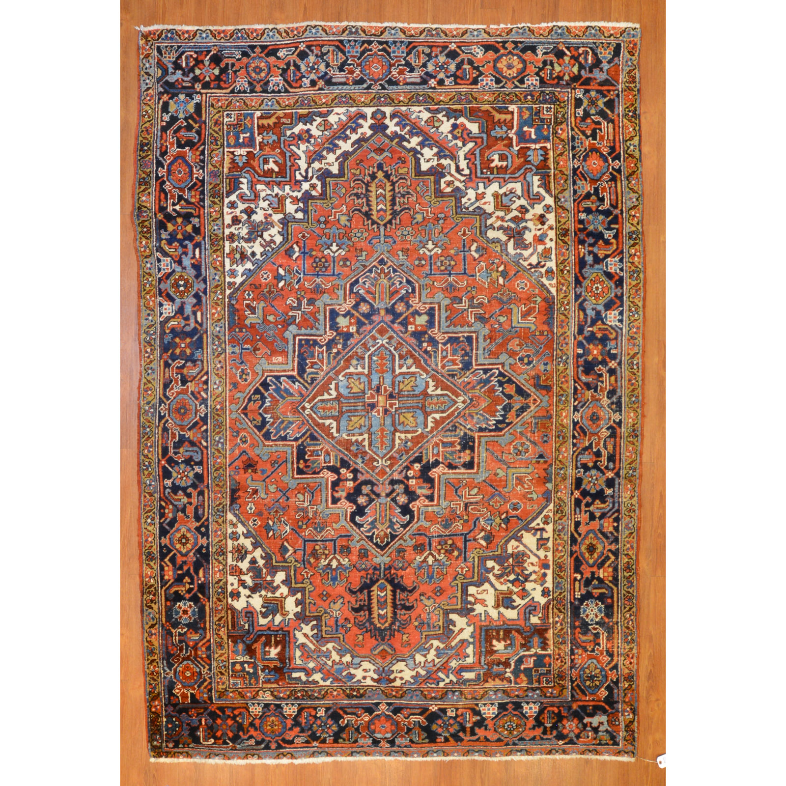 Appraisal: HERIZ RUG PERSIA X Third quarter- th century hand-knotted wool