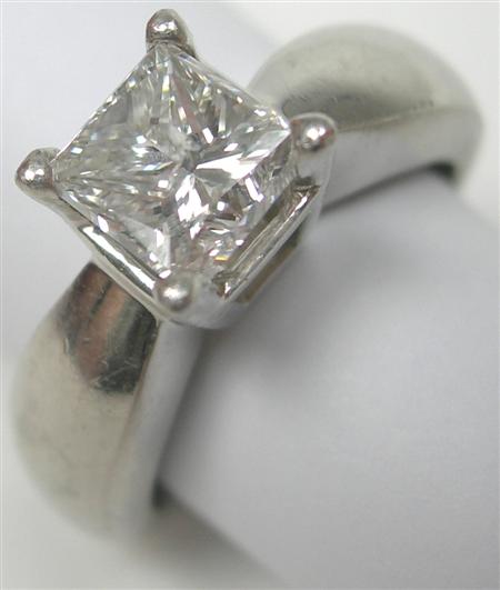 Appraisal: A modern platinum mounted diamond single-stone corner claw set with