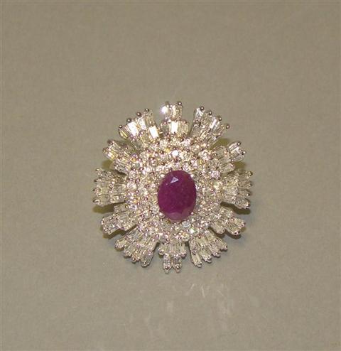 Appraisal: LADY'S DIAMOND AND RUBY COCKTAIL RING Centered by an oval