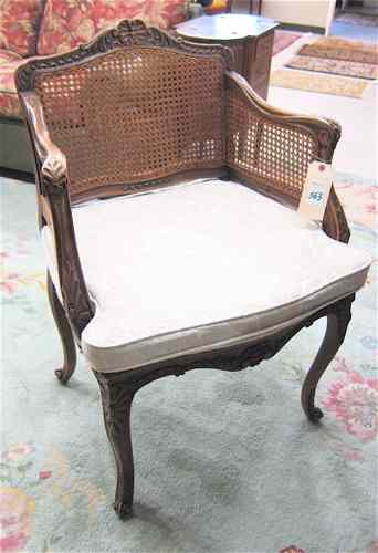 Appraisal: LOUIS XV STYLE ARMCHAIR French early th century the carved