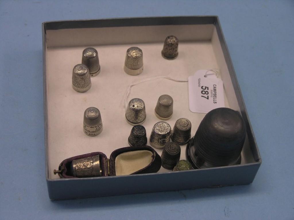 Appraisal: Thirteen various silver thimbles large novelty plated thimble and a