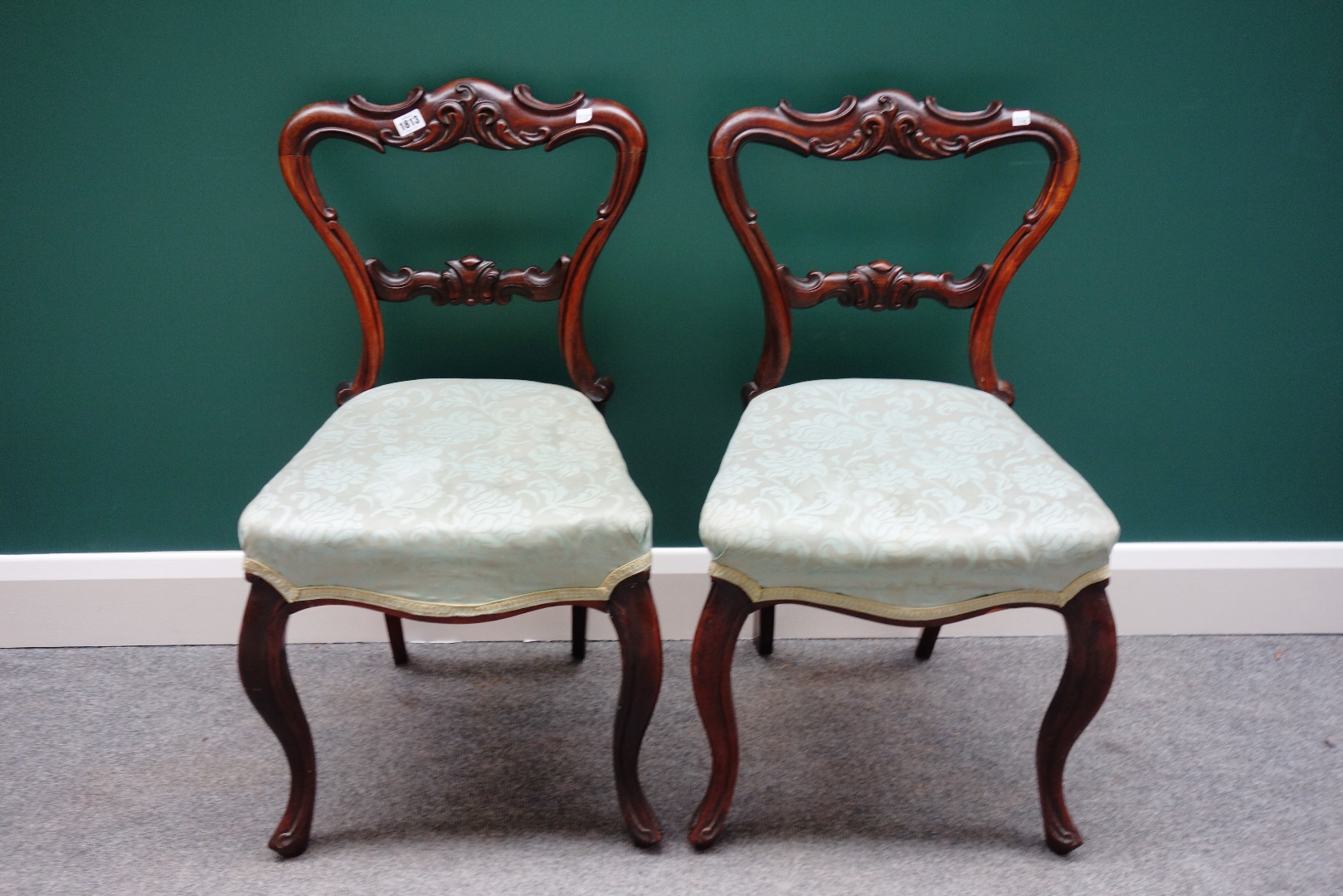 Appraisal: A set of six Victorian rosewood balloon back dining chairs