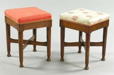 Appraisal: A pair of th century continental walnut stools with differing