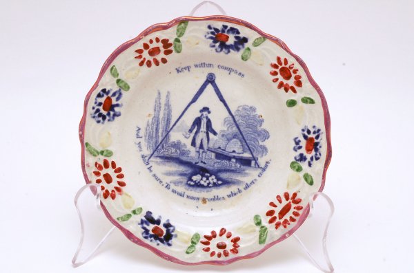 Appraisal: Masonic softpaste plate center scene of man with beehives under