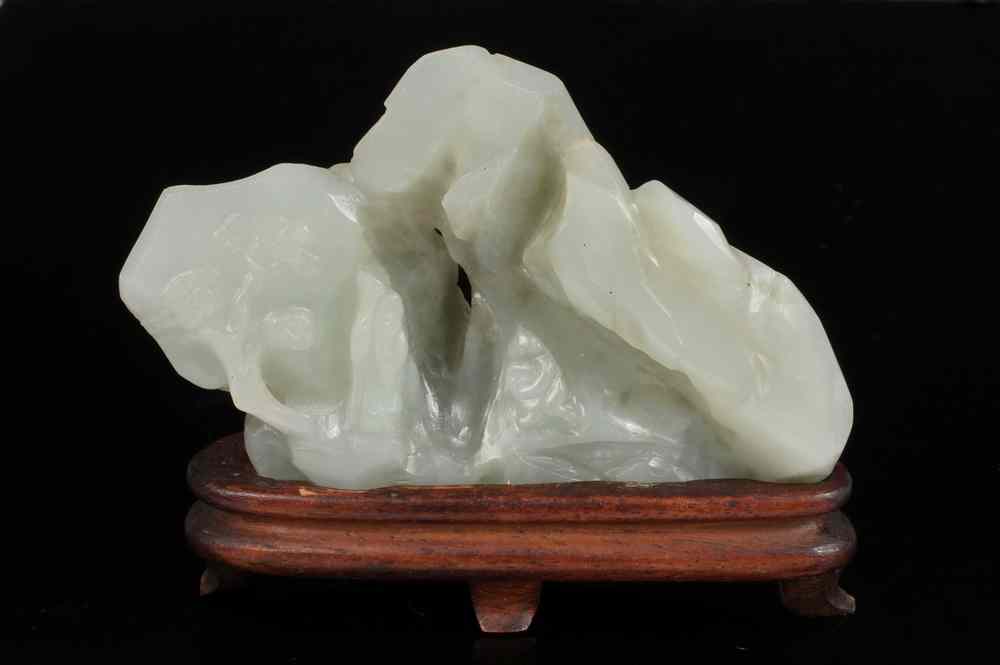 Appraisal: CHINESE JADE SCULPTURE - th c Celadon Jade Sculpture of