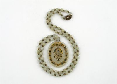 Appraisal: An Indian jade pendant onlaid in the kundan technique with