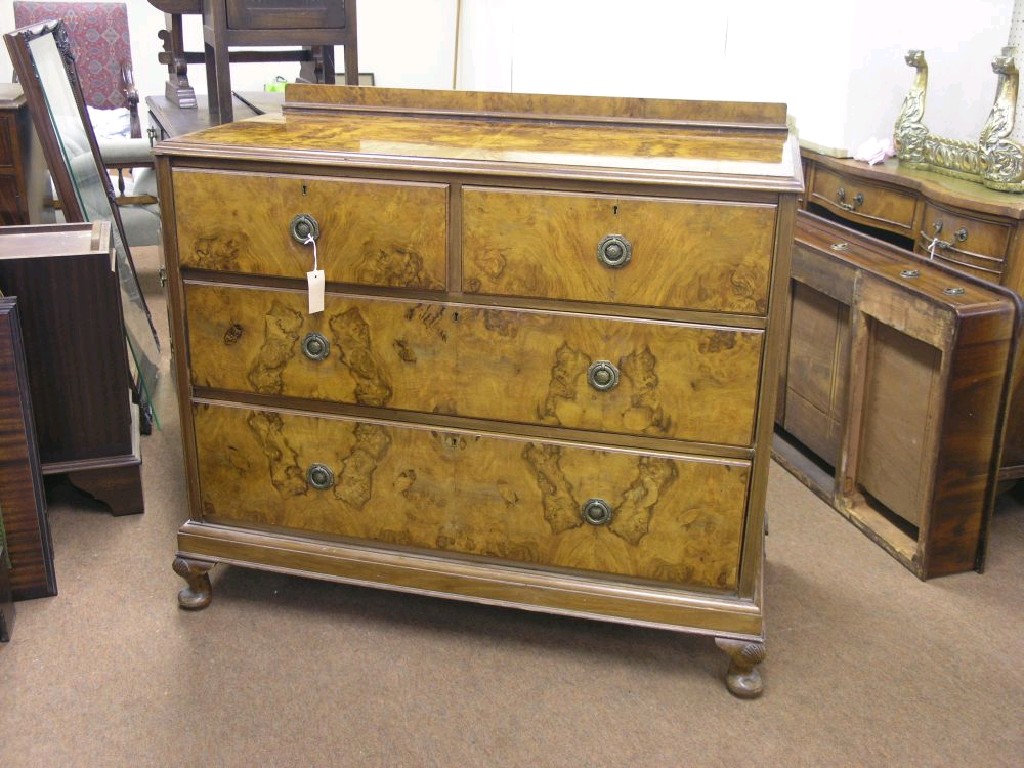 Appraisal: A burr walnut veneered bedroom chest two short and two