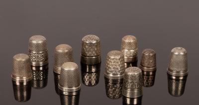 Appraisal: Four sterling silver thimbles The Spa Henry Griffith Son a