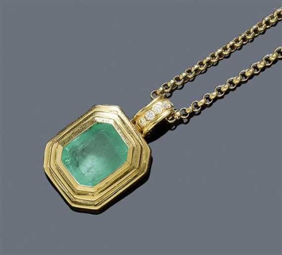 Appraisal: EMERALD AND DIAMOND PENDANT Yellow gold Casual-elegant pendant set with