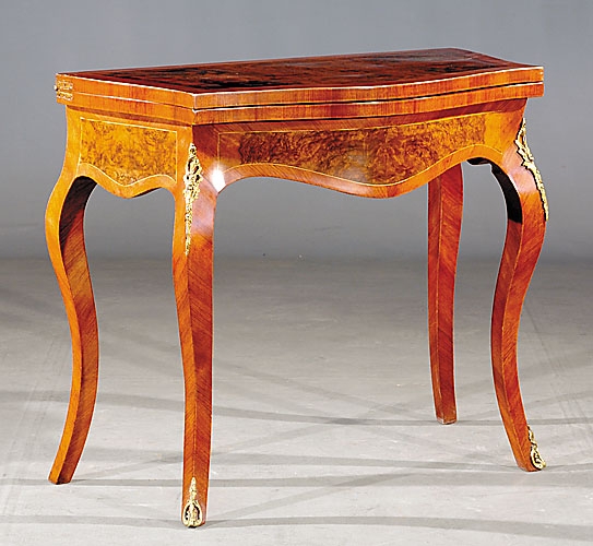 Appraisal: Louis XV style mixed wood games table serpentine folding top