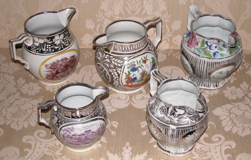 Appraisal: Title Various Silver Resist Pitchers one ribbed one with mulberry