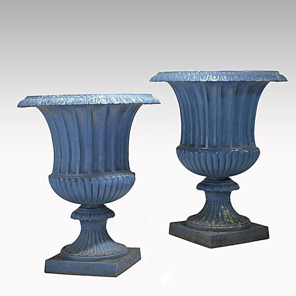 Appraisal: GARDEN DECORATIONLarge pair of blue cast iron urns fluted sides