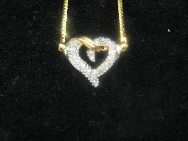 Appraisal: Diamond Heart Necklace small diamonds k yellow white gold