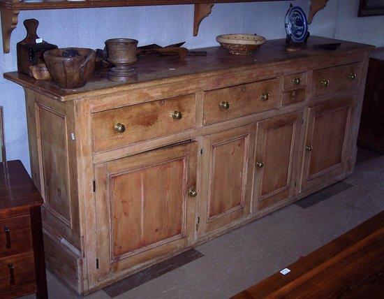 Appraisal: A pine dresser base fitted an arrangement of five drawers