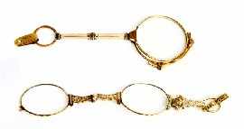 Appraisal: Two antique gilt metal lorgnettes