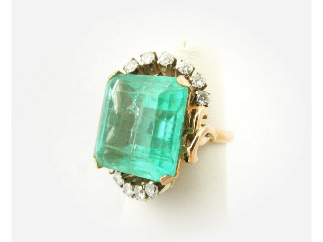 Appraisal: Lady's K yellow gold ring set with emerald-cut ct emerald