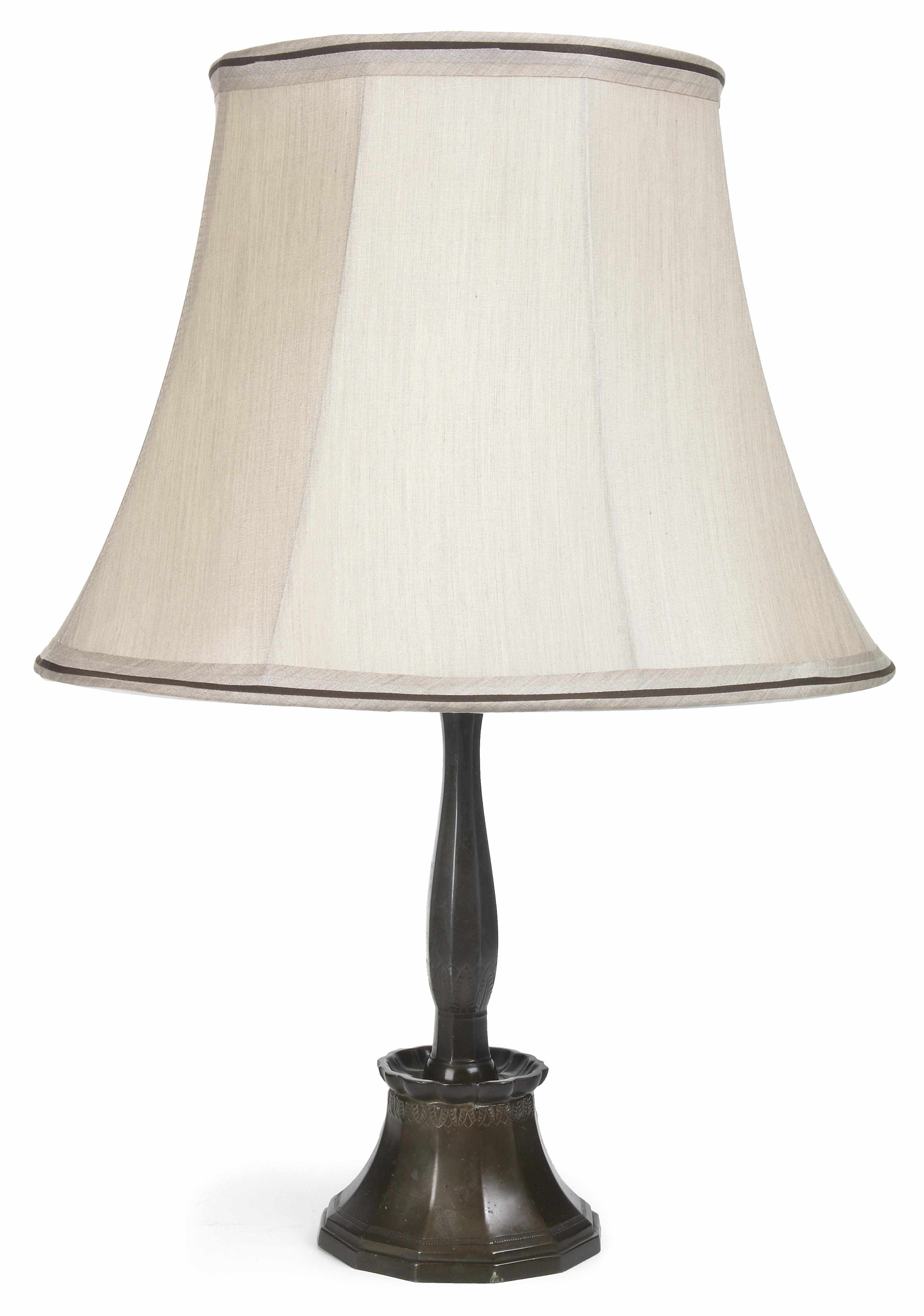 Appraisal: A Just Andersen diskometal table lamp impressed JUST within a