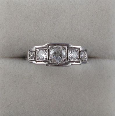 Appraisal: A diamond five stone ring The five graduated circular cut