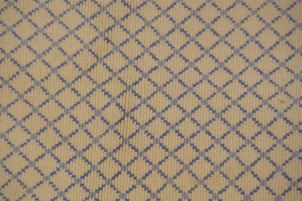 Appraisal: BLUE AND WHITE TRELLIS DESIGN CARPET of rectangular form with