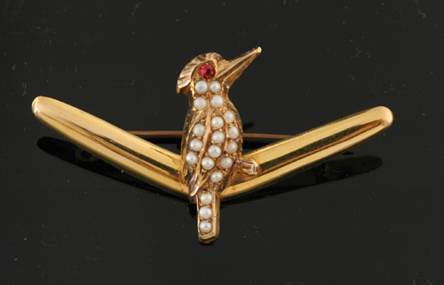 Appraisal: An Australian gold kookaburra brooch Set with seed pearls and