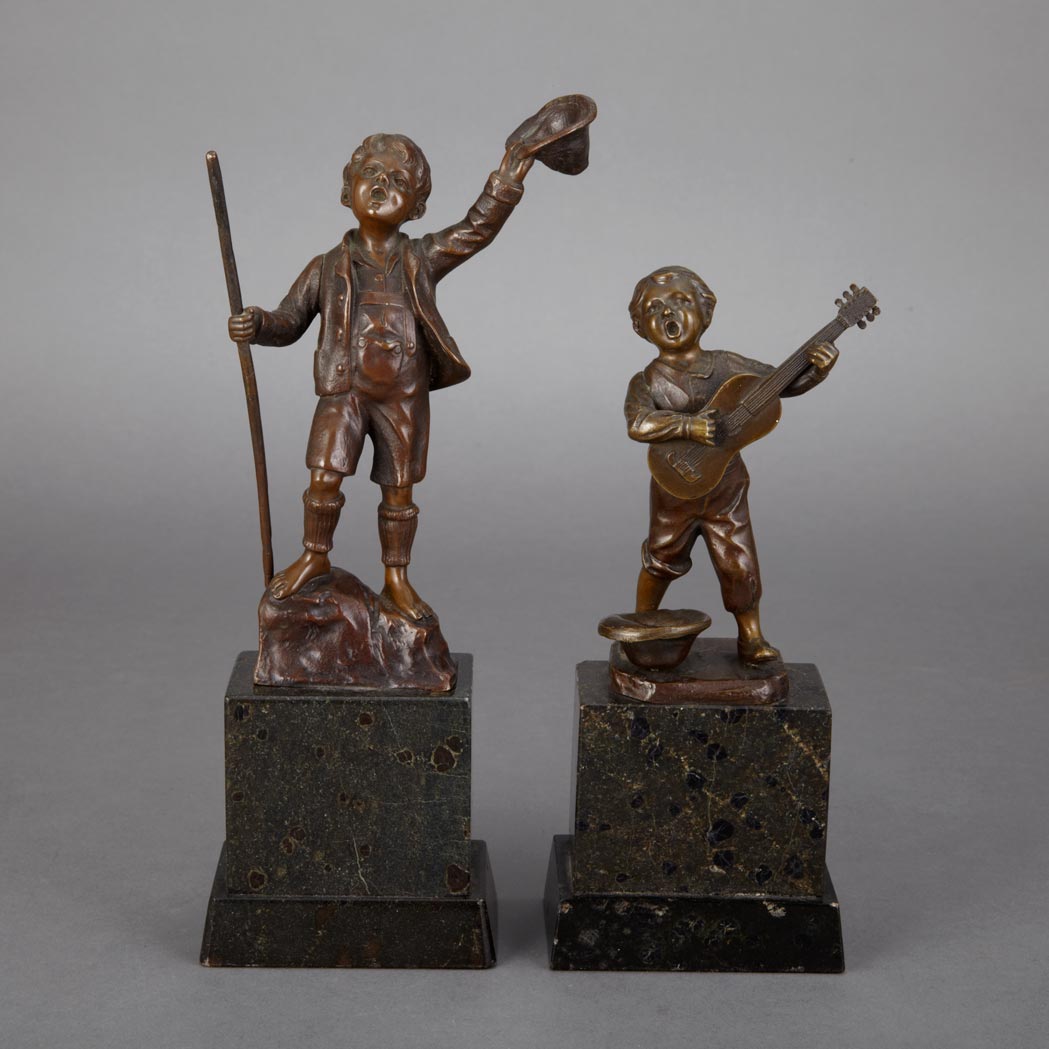 Appraisal: Two Bronze Figures of Young Boys Late th early th