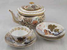 Appraisal: A New Hall China teapot AF tea cup and four