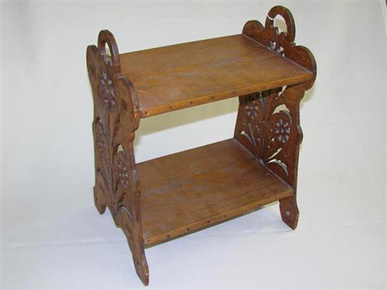 Appraisal: FOLK ART SHELF With elaborately scroll-cut curly maple ends and