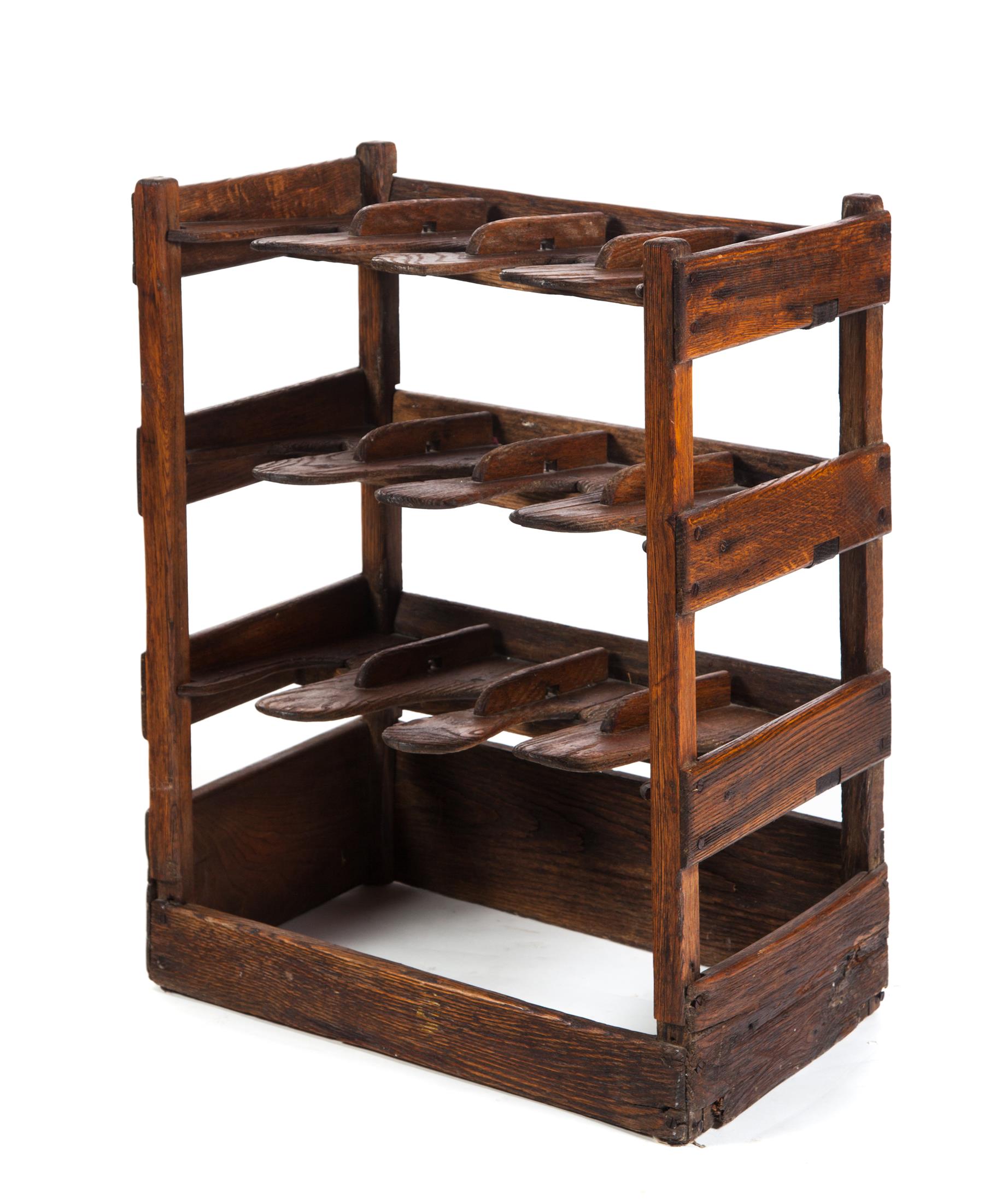 Appraisal: OAK SHOE RACK American ca Three shelves with cutouts for