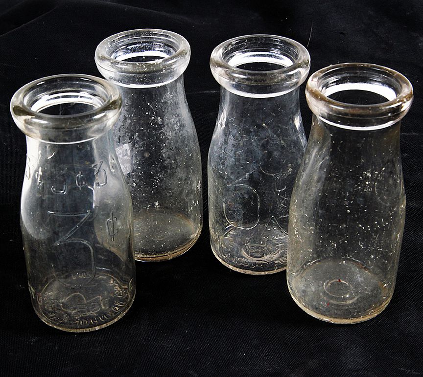 Appraisal: Collection of Half-Pint Store Milk Bottles Two are embossed with