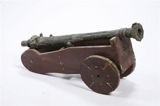 Appraisal: SIGNALING CANNON Nineteenth century bronze Cast decoration and mounted on