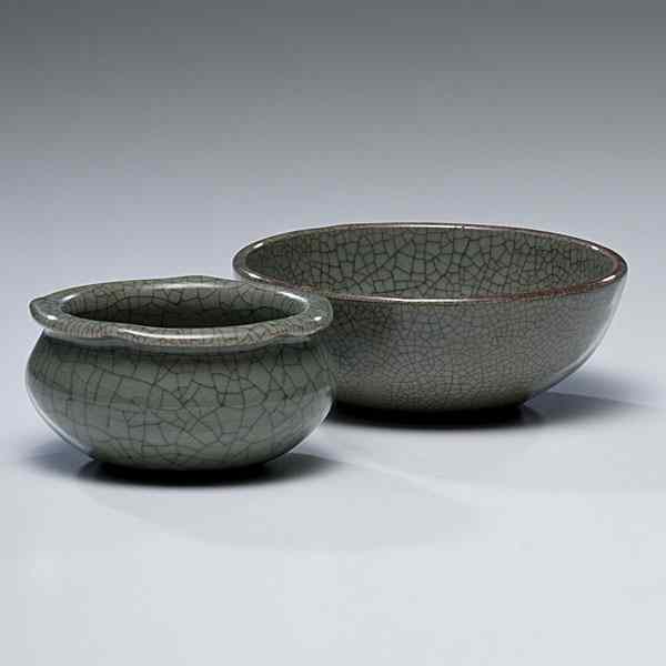 Appraisal: Celadon Crackle-Glazed Bowls Chinese Two celadon crackle-glazed bowls each with