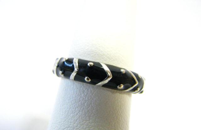 Appraisal: Hildalgo Ladies Sterling Silver Black Enameled Band with Accent Diamonds