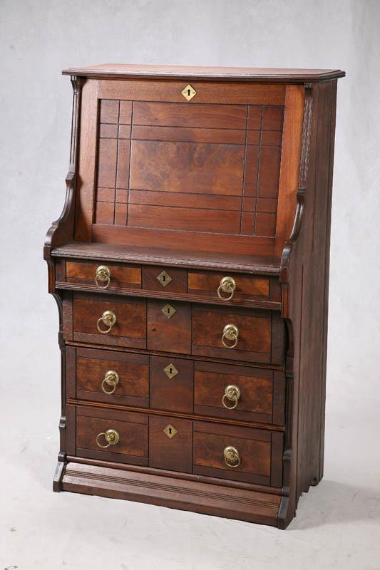 Appraisal: DROP LID DESK Walnut with four bottom drawers with brass