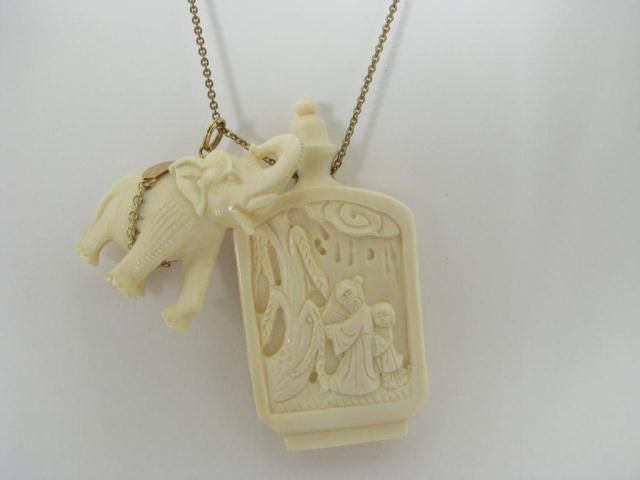 Appraisal: Asian Motif Necklace with Ivory Elephant saddle is k yellow