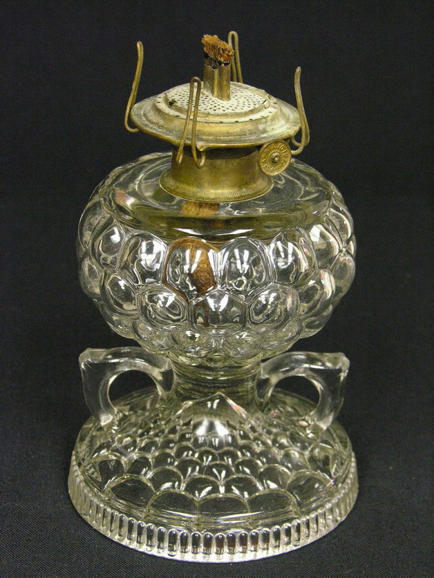 Appraisal: DOUBLE FINGER HOLD HONEYCOMB OIL LAMP Size Condition No damage