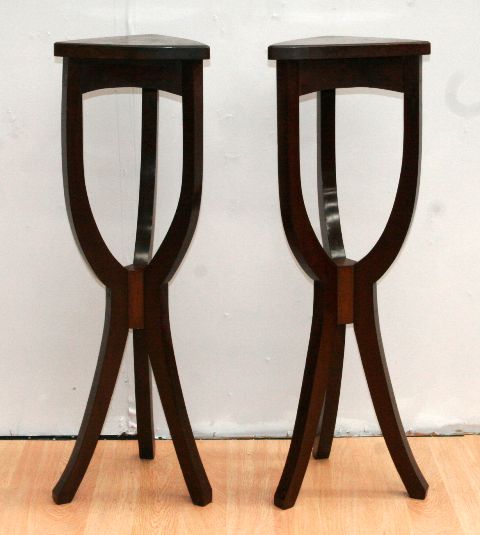 Appraisal: A pair of Art Nouveau style oak pedestals cm tall