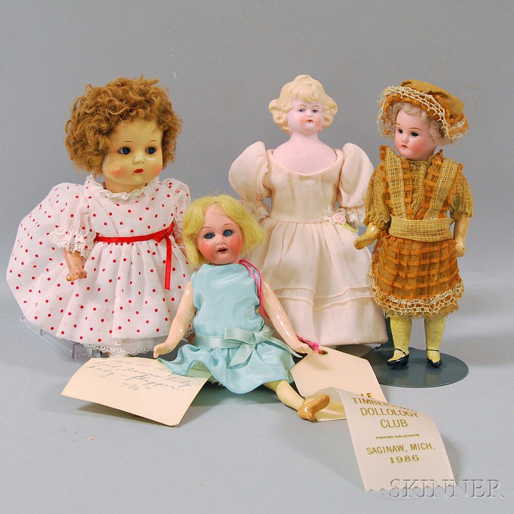 Appraisal: Four Small Bisque Dolls Germany an R A girl in