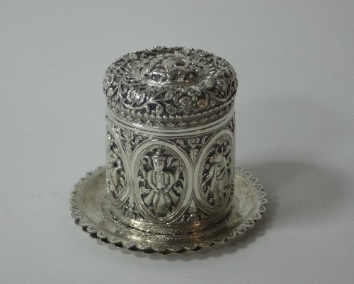 Appraisal: An Indian white metal jar and cover the cover embossed