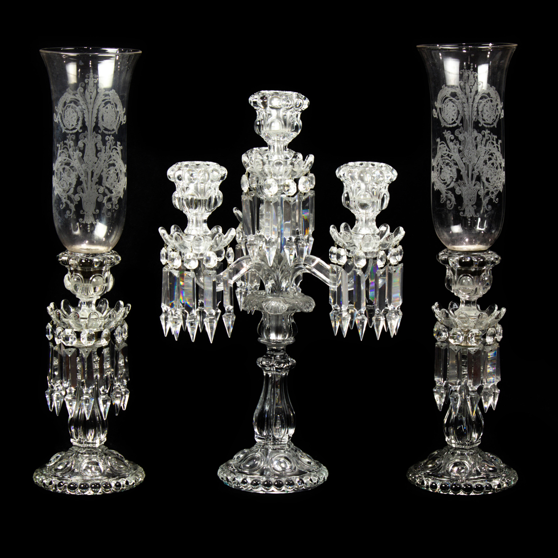 Appraisal: A BACCARAT MOLDED GLASS ASSEMBLED CANDLE GARNITURE IN THE MEDALLION