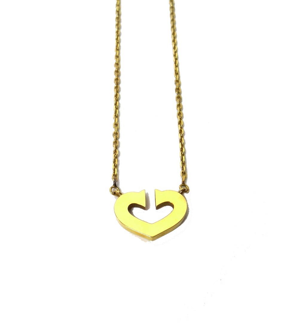 Appraisal: A Cartier ct yellow gold heart shaped pendant necklace on