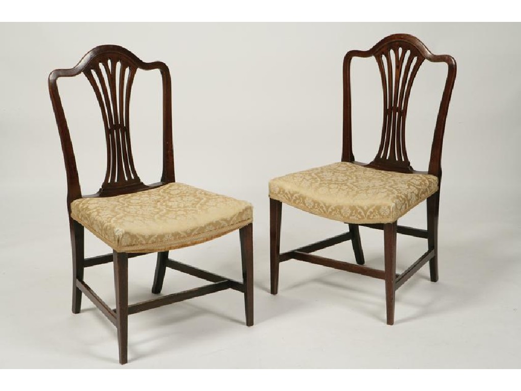 Appraisal: A PAIR OF GEORGE III MAHOGANY DINING CHAIRS the arched