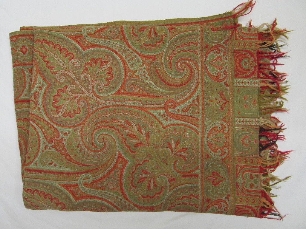 Appraisal: A Paisley shawl of traditional type with large foliate panels