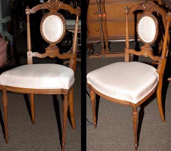 Appraisal: Pair of Victorian carved walnut upholstered side chairs Estimate -