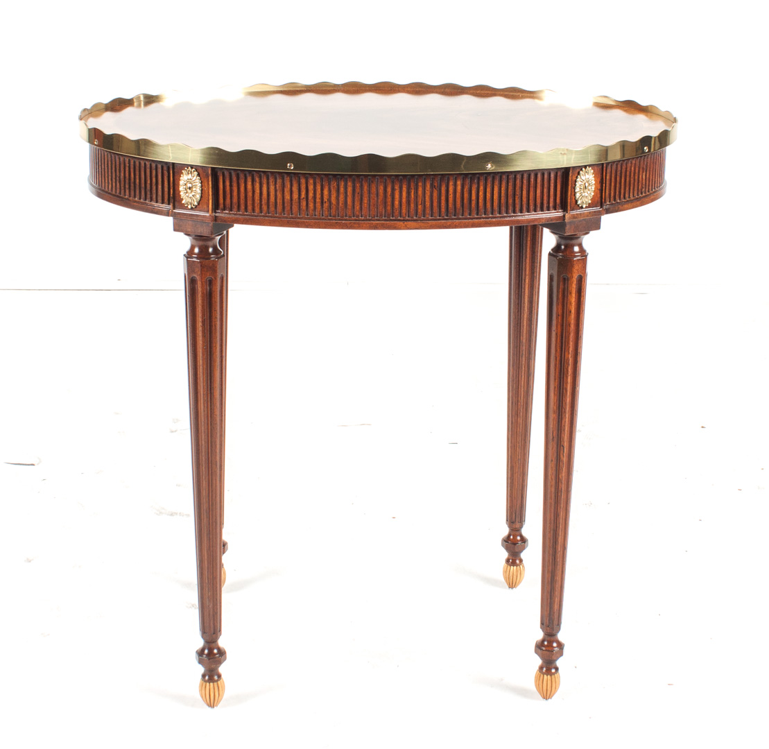 Appraisal: Baker Regency style mahogany tea table from the Stately Homes