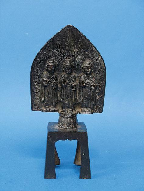 Appraisal: A CHINESE BRONZE cast with a line of three immortals